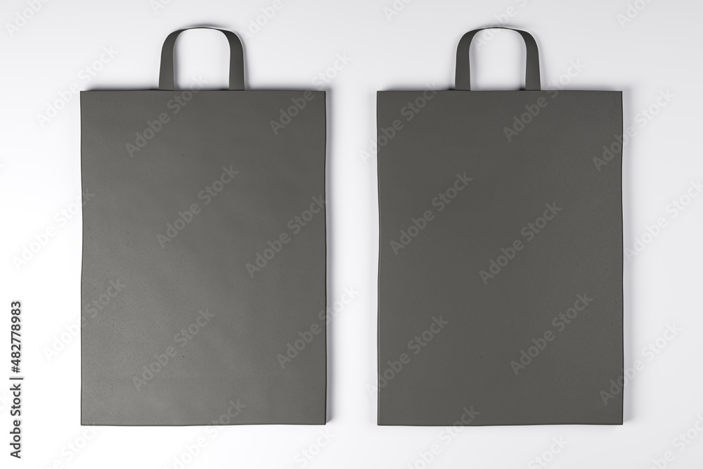 Poster close up of empty paper bags on white background. mock up place for your advertisement or logo. 3d r