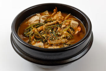 Soybean paste stew with shepherd's purse and crab on a white background
