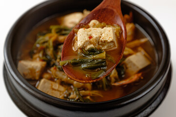 Soybean paste stew with shepherd's purse and crab on a white background