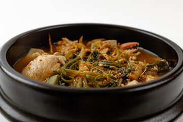 Soybean paste stew with shepherd's purse and crab on a white background