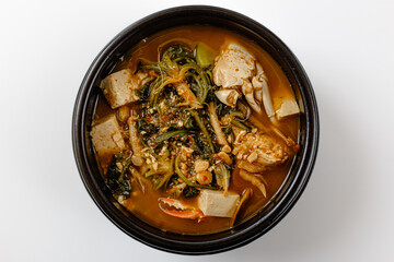 Soybean paste stew with shepherd's purse and crab on a white background