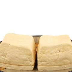 tofu on the plate  on a white background .