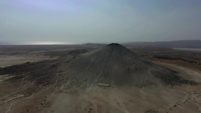 Aerial View Chandragup Mud Volcano. Dolly Forward Establishing Shot