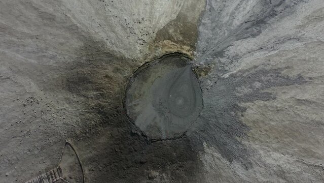 Aerial Top Down View Into Mud Pool Crater At Balochistan. Pedestal Up