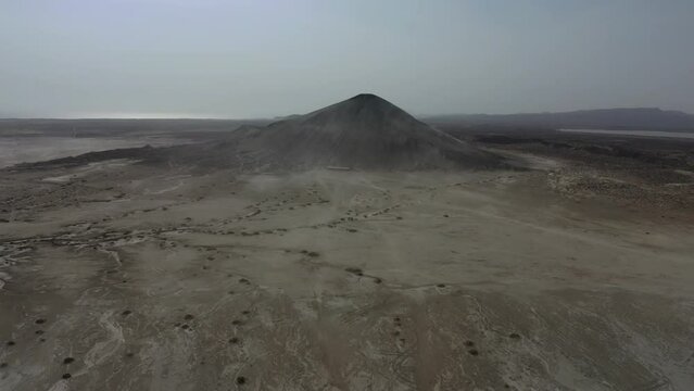 Aerial View Over Dry Arid Landscape Towards Mud Volcano At Hingol National Park . Dolly Forward