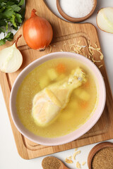 Concept of cooking chicken soup on white background