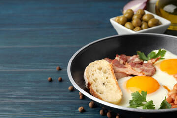 Concept of tasty breakfast on wooden background