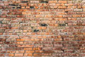 Old red brick wall.