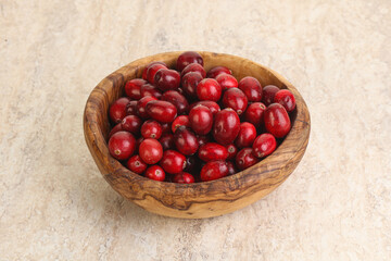 Ripe sweet tasty cranberry in the bowl
