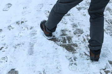 Man slipping on the snow.