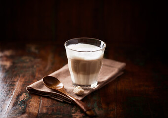 Coffee with milk on wooden background. Soft focus. Copy space.