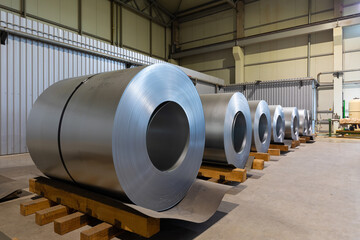 Closeup photo of metal tile for roof in metallic forming machine production line in factory. Manufacture and production