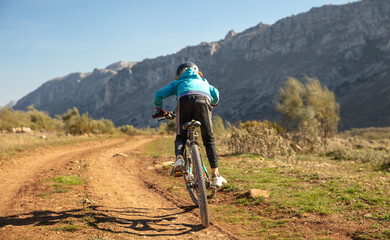 Obraz premium children riding with mountain bike