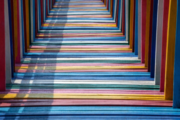 rainbow-colored wooden bridge.