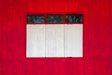 white window on red wall