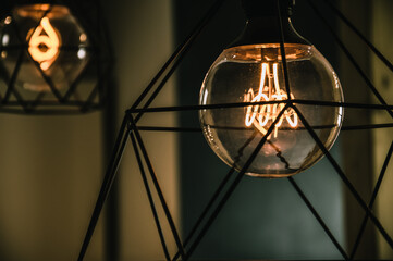 Fototapeta na wymiar chandelier with designer light bulb