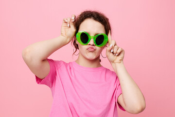 Young woman with green glasses decoration gesture with his hands Lifestyle
