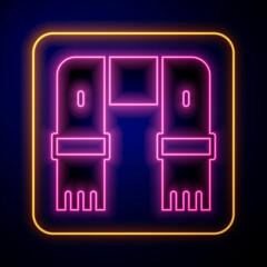 Glowing neon Winter scarf icon isolated on black background. Vector