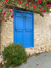 Fototapeta na wymiar Old vintage blue door of the village house