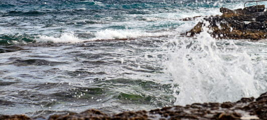 Malta, sea waves crash against the rocks
