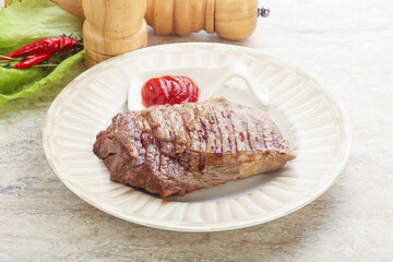 Grilled rib-eye steak beef meat