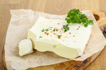 Greek Feta cheese over board