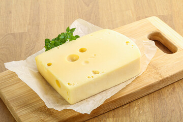 Maasdam cheese over the board