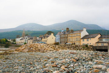 A view of the Mountains of Mourne  and Tollymore Forest Park from the stony breakwater on the beach...