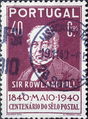 Portugal - circa 1940: a postage stamp from Portugal, showing a.a portrait of Sir Rowland Hill the reformer of the English postal system