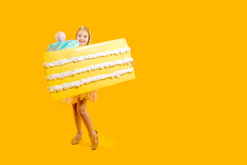 Sweetness. Delicious dessert. Confectionery. The girl is holding a huge pink piece of cake in her...
