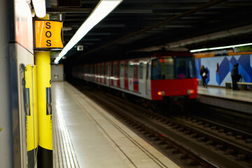 Sign symbol SOS.Subway metro train station platform with. Metropolitan railroad, railway