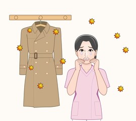花粉のついたコートと女性