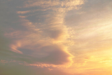 Naklejka na ściany i meble Cloudy colorful sky at sunset.