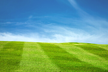 Green grass mountain landscape in summer with beautiful blue sky and white clouds. nature background