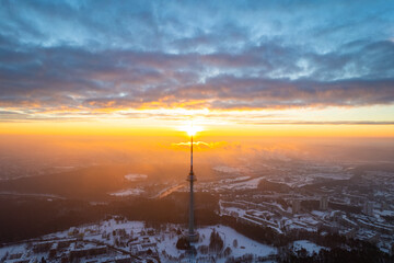 Aerial winter sunny morning sunrise view of Vilnius TV Tower, Lithuania