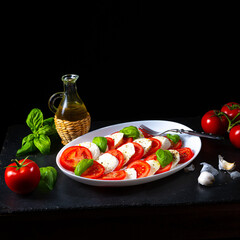 Tomato with mozzarella and basil