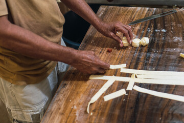 Making cheese in a traditional workshop