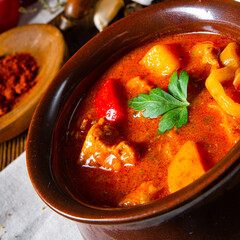 Hungarian goulash soup in a cauldron or pot