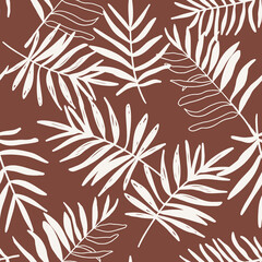 Palm tree leaves seamless repeat pattern. Random placed, hand drawn plant elements all over surface print on brown background.