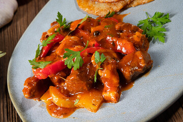 Original Hungarian goulash with potato pancakes
