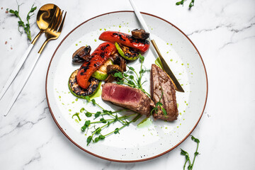 Grilled tuna with spice. tuna steak with vegetables. tuna grill seafood fried barbecue fish grilled. diet vegetarian fish dish, Ketogenic, keto or paleo diet lunch, Healthy food trend. Top view
