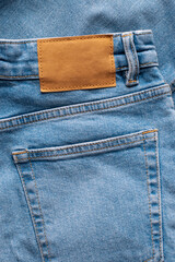 Label mockup on blue denim from recycled paper.