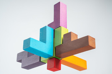 Abstract construction from wooden blocks. The concept of logical thinking..