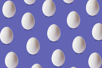 Many white easter eggs on the modern very peri color background