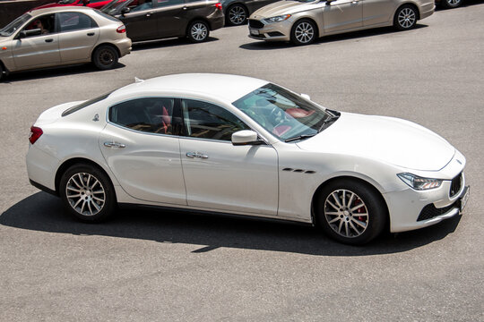 Kiev, Ukraine - June 19, 2021: White Maserati Ghibli on the road