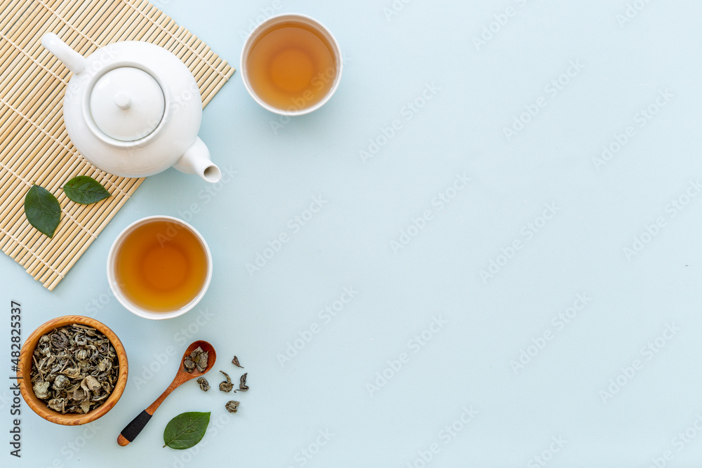 Wall mural tea ceremony with with white teapot and two cups, top view