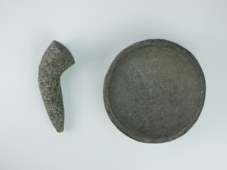 Indonesian traditional mortar and pestle isolated on a white background