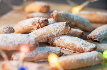 Homemade cookies with fruit jam and cottage cheese on a light wooden background. A close up photo. Dessert for breakfast.