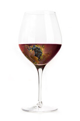Red wine grapes in a glass, creative collage. Elegant wineglass, isolated on a white background