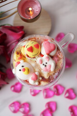 Cocoa with cute marshmallows. Date and valentine's day concept. Top view, vertical photo